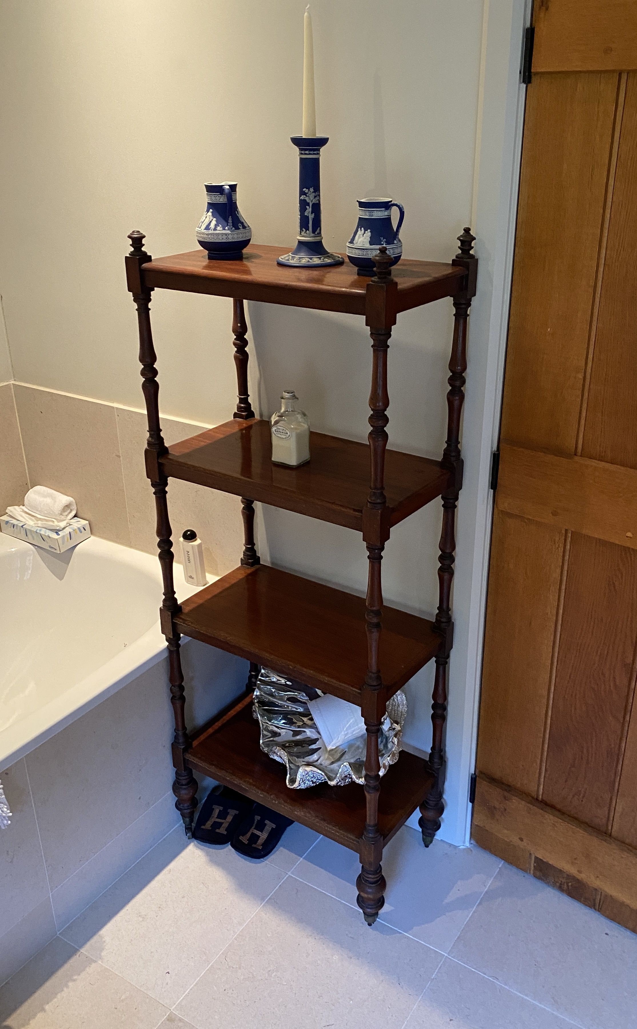 An early Victorian mahogany four tier whatnot, width 56cm depth 31cm height 143cm